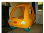 Bright yellow Snooze and Cruise toddler bed - looks like....